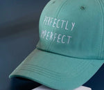 PERFECTLY IMPERFECT BASEBALL CAP